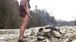 springbreaker nudist with cock ring at a bonfire